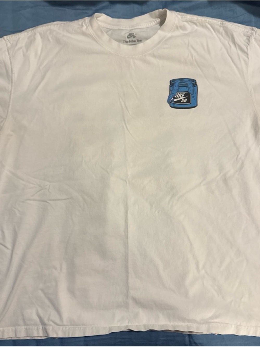 Nike White Short-Sleeve Tee with Blue Chest Graphic